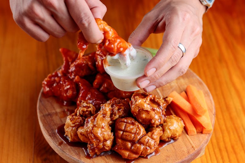 wings over menu — bold chicken wings and sauces